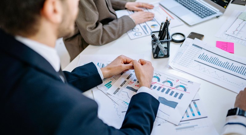 Finance professionals reviewing business funding options