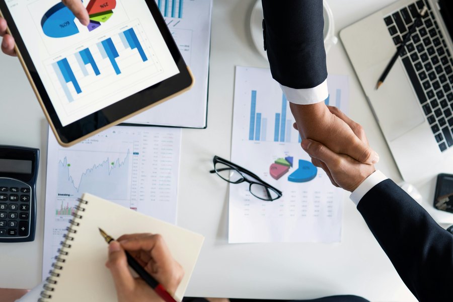 Business meeting with financial documents